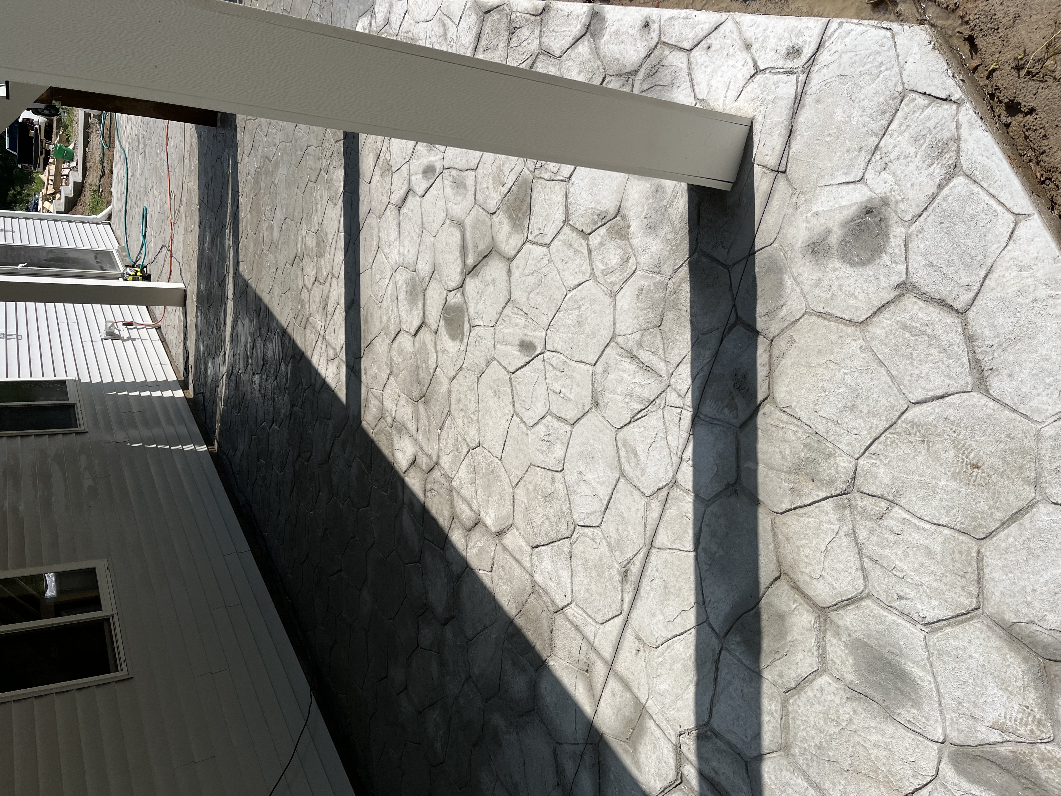 Stamped concrete patio with natural stone pattern