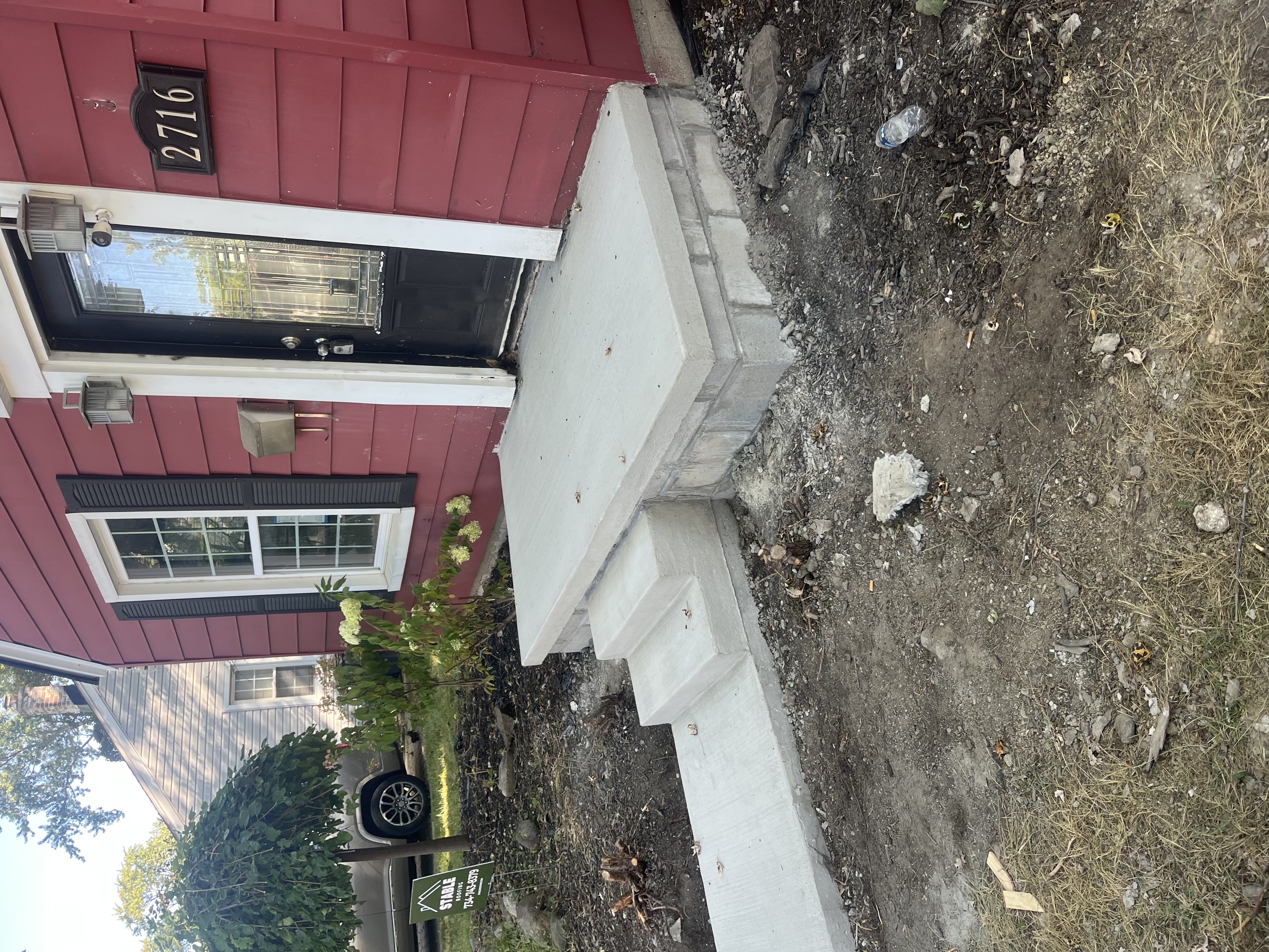 Concrete front steps and walkway installation